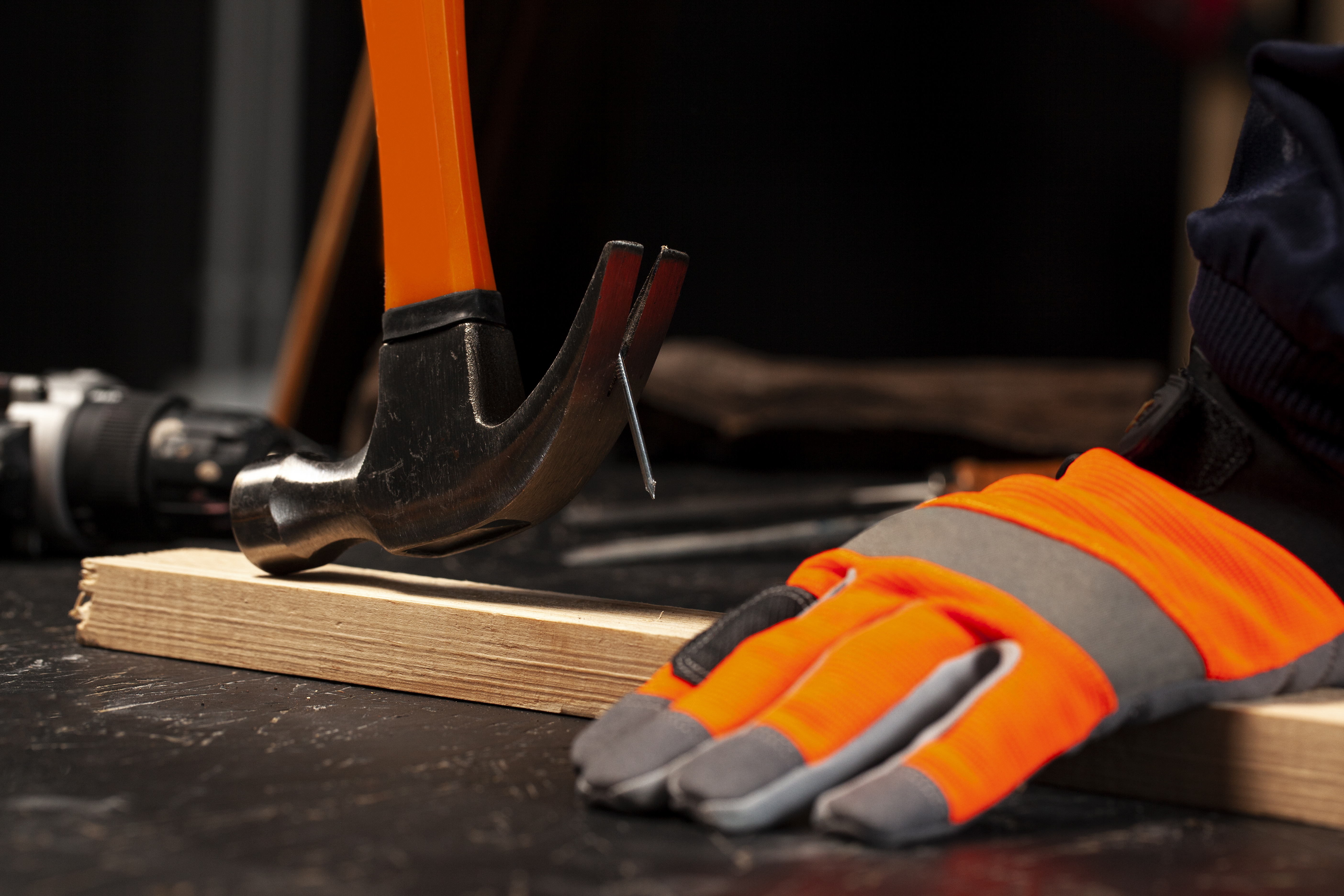 Hammer, gloves and construction tools